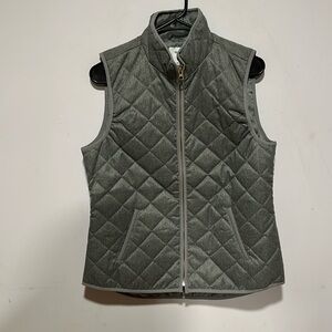 ON quilted vest.